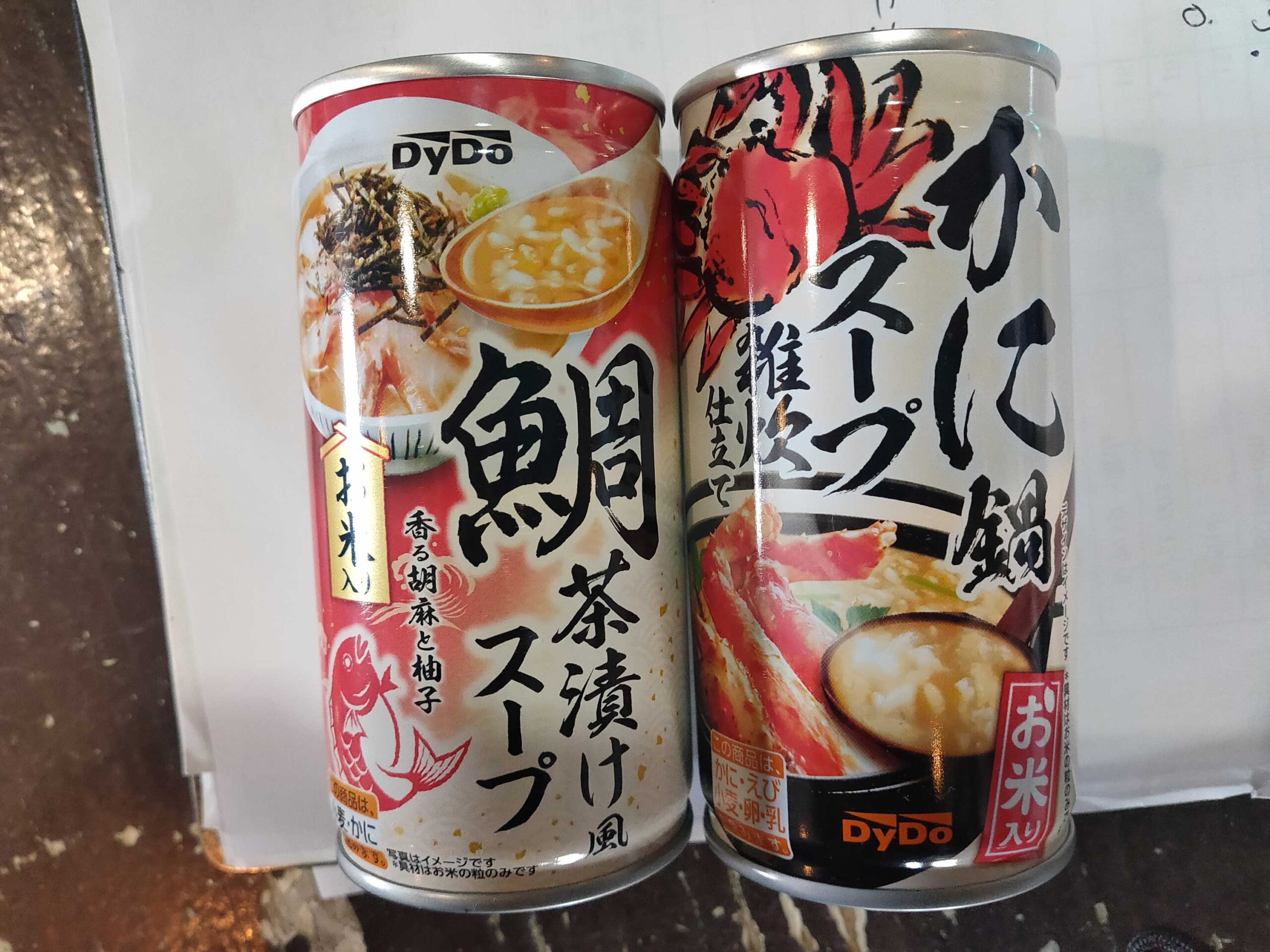 ダイソーで販売。缶入り　鍋スープ　お米入り　「かに味」「タイ味」